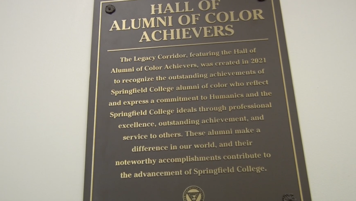 As part of Springfield College Homecoming Weekend 2021, there was a special ribbon cutting ceremony on Saturday, Oct. 2 celebrating the opening of the Hall of Alumni of Color Achievers Legacy Corridor outside the Office of Multicultural Affairs on the second floor of the Campus Union.